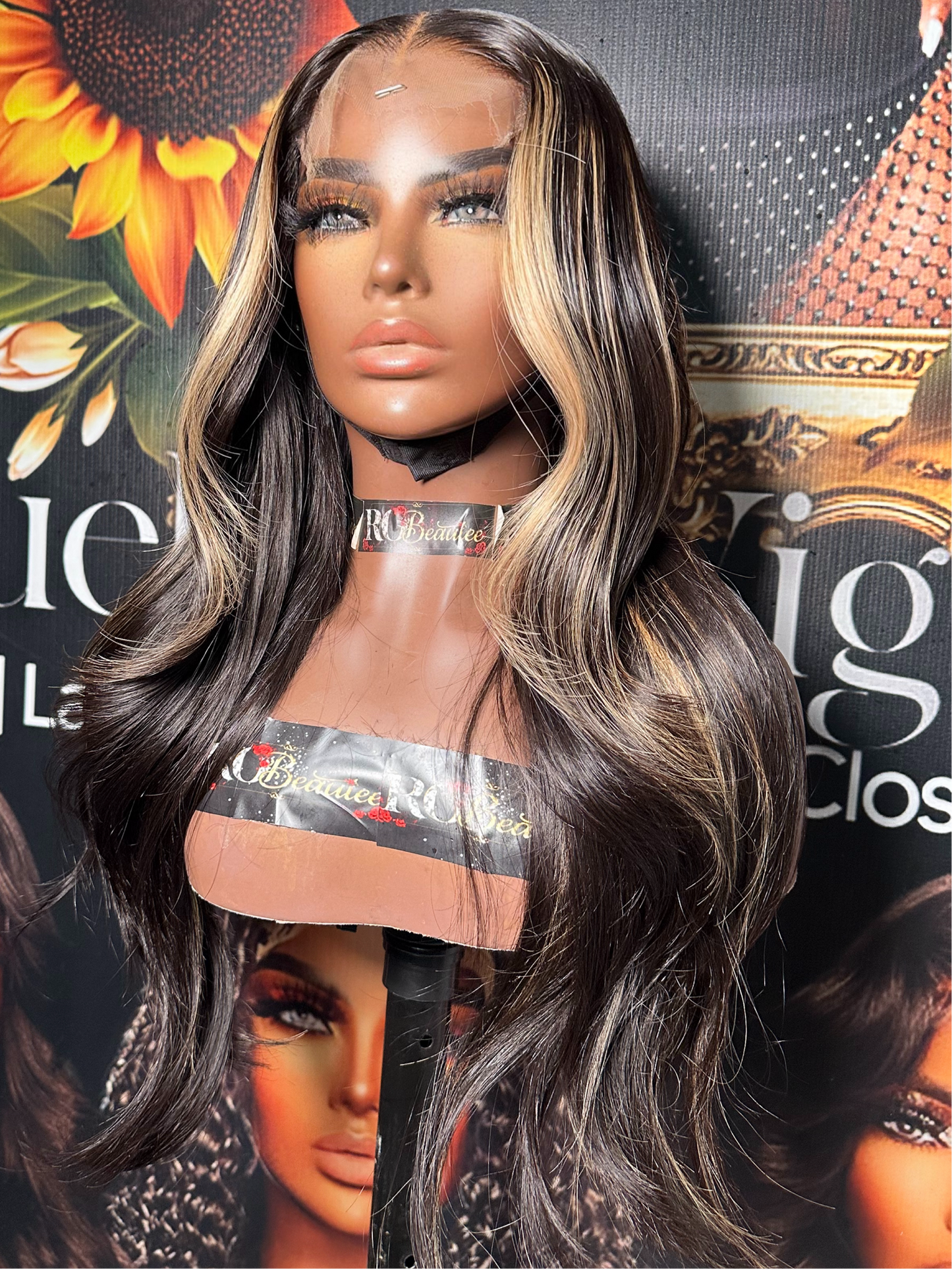 Brunette wig with blond highlights.